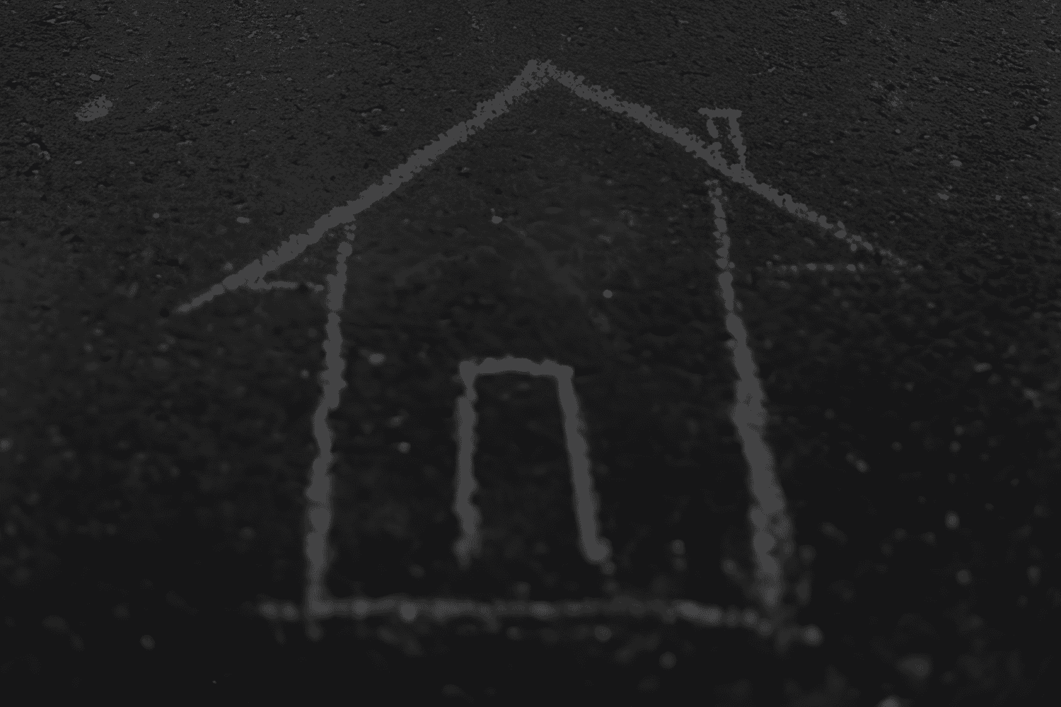 Desenho de uma casa a giz no chão